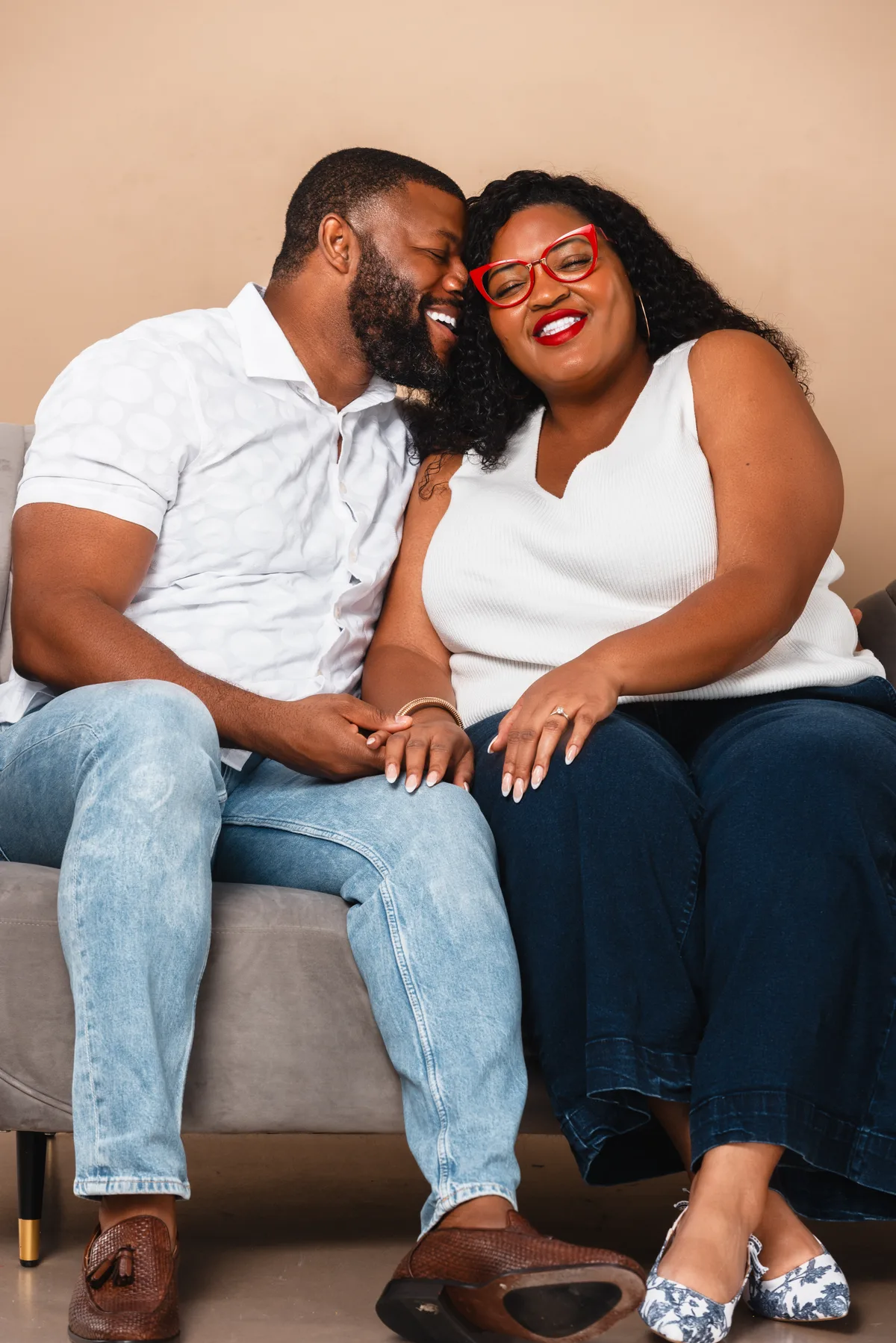 Happy couple holding hands and smiling together